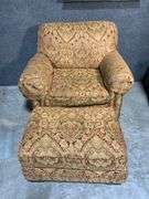 Upholstered Armchair and Ottoman with Brass Nailhead Trim