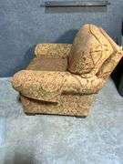 Upholstered Armchair and Ottoman with Brass Nailhead Trim