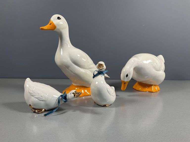 Set of Four Glazed Ceramic Duck Figurines with Hand-Painted Details