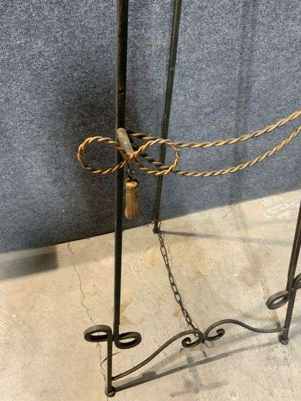 Black Metal Easel with Decorative Palm Tree Motif