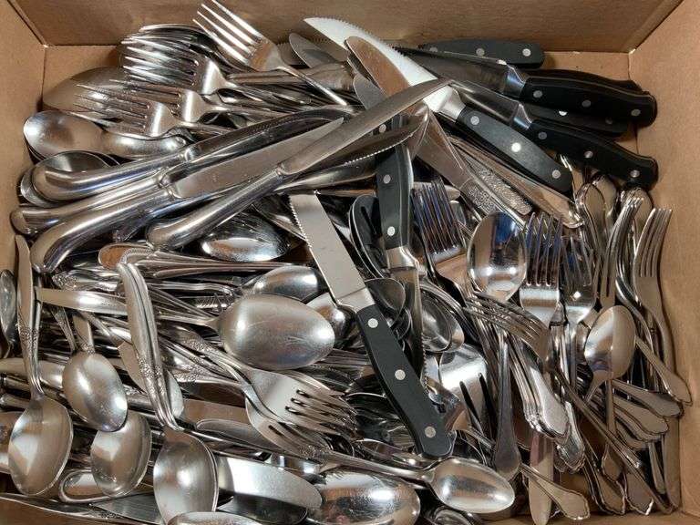 Large Assortment of Stainless Steel Flatware and Knives