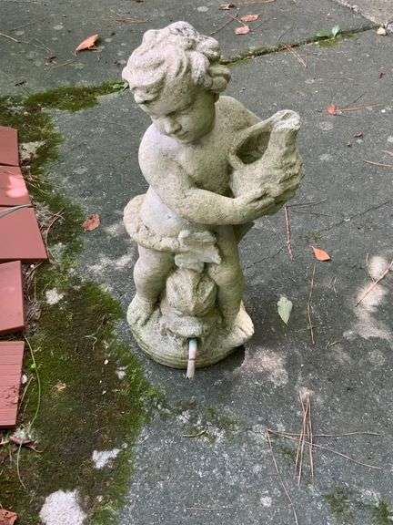 Concrete Figure Holding Seashell
