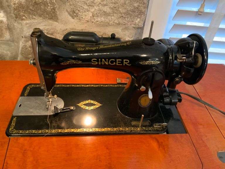 Singer Sewing Machine with Wooden Cabinet