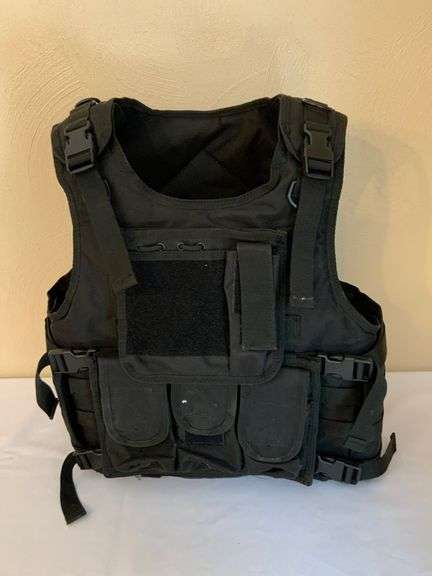 Black Tactical Vest with Adjustable Straps and Multiple Pouches
