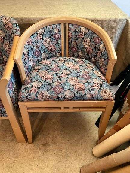 Two Wooden Chairs With Floral Upholstery