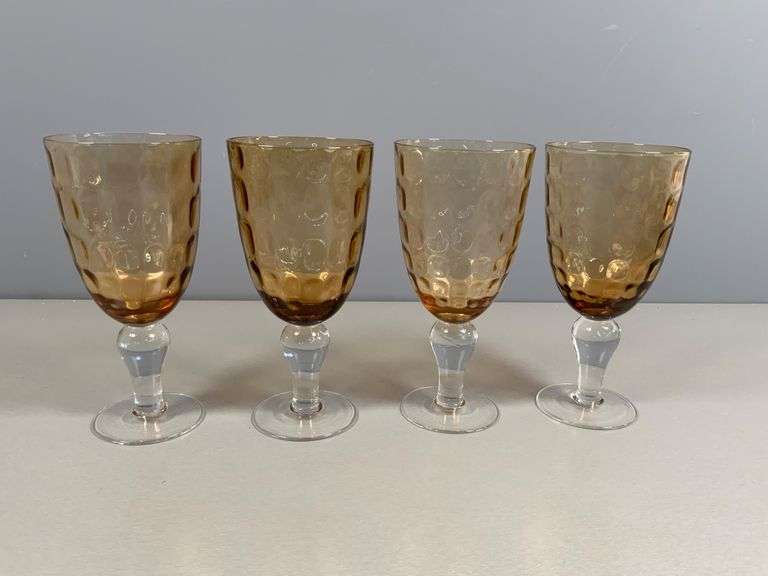 Four Amber-Colored Goblets with Clear Stems