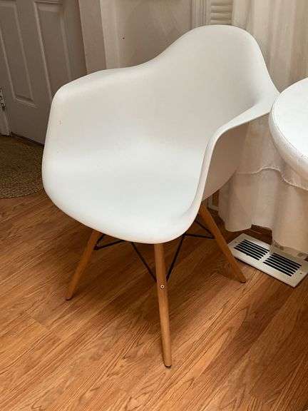 White Molded Chair with Wooden Legs and Metal Supports
