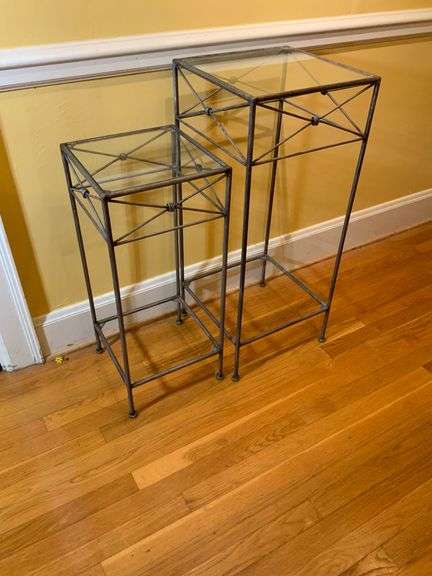 Two Metal and Glass Pedestal Tables