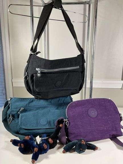 Four Kipling Nylon Shoulder Bags with Monkey Keychains