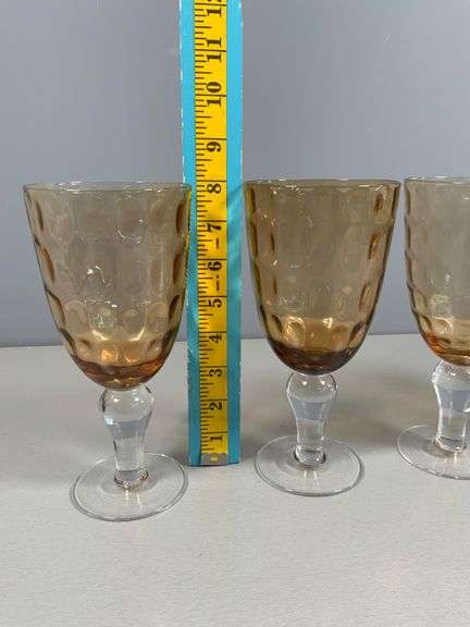Four Amber-Colored Goblets with Clear Stems