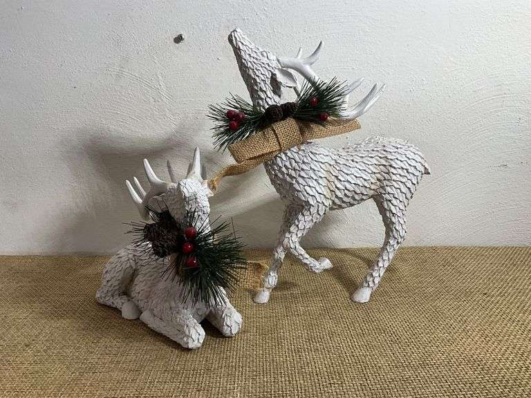 Two White Textured Reindeer Figurines with Holiday Accents
