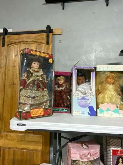 Boxed and Unboxed Porcelain and Vinyl Dolls From Various Makers