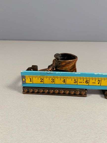 Copper-Finished Baby Shoe Bookends on Decorative Bases