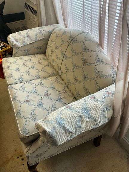 Upholstered Loveseat with Floral Pattern and Wood Legs