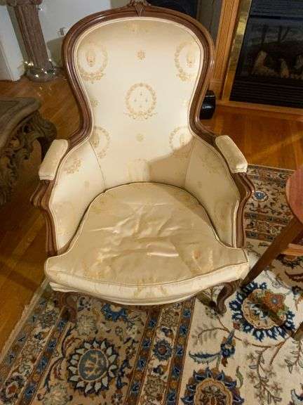 Victorian-Style Armchair With Carved Wood Frame and Upholstered Back