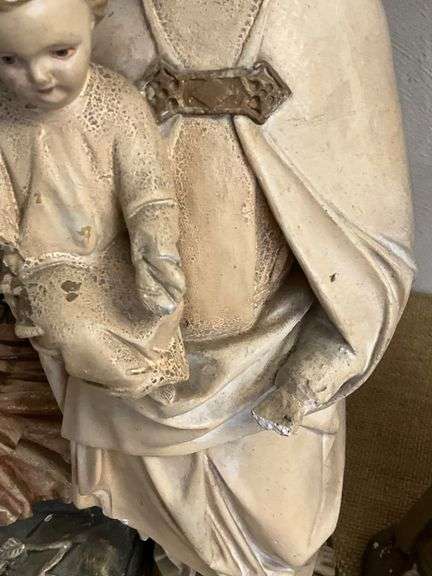 Four Religious Figurines Featuring Virgin Mary, Jesus, and Saints