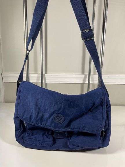 Four Kipling Nylon Shoulder Bags with Monkey Keychains