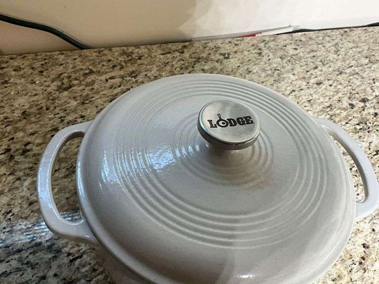 Lodge and Smith & Clark Cast Iron Dutch Ovens