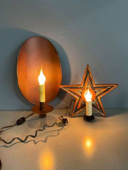 Two Decorative Electric Candle Lamps with Star and Oval Designs