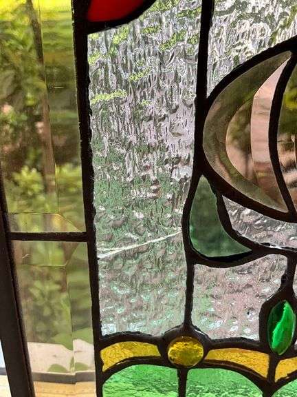 Stained Glass Panel With Floral and Geometric Design
