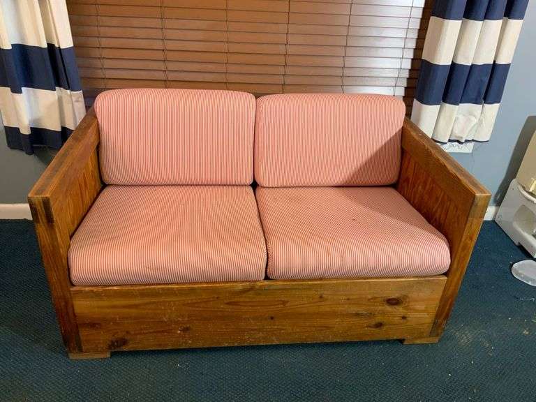 Wooden Loveseat with Red and White Striped Cushions