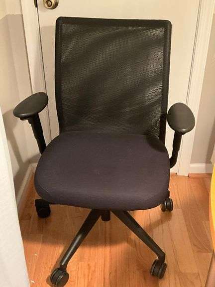 Black Mesh Office Chair With Padded Seat and Adjustable Features