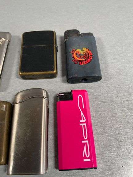 Eight Cigarette Lighters Including Zippo, Marlboro and Capri