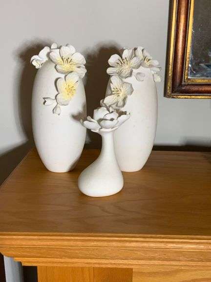 Three White Ceramic Vases with Applied Floral Detailing