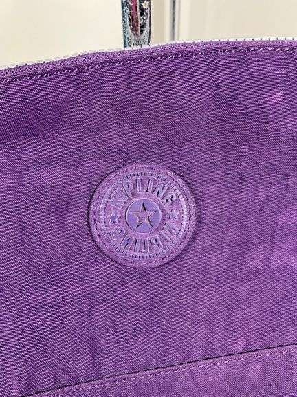 Four Kipling Nylon Shoulder Bags with Monkey Keychains