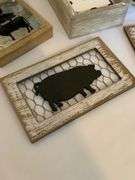 Farmhouse-Style Decor With Pig Artwork and Embellishments