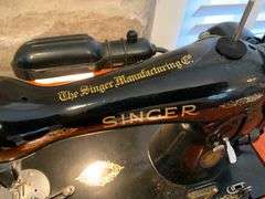 Singer Sewing Machine with Wooden Cabinet