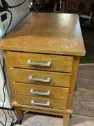 Wooden Chest of Drawers With Metallic Handles and Three Compartments