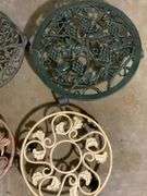 Four Decorative Metal Plant Stands on Wheels