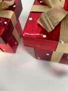 Three Decorative Red Metal Holiday Trees with Presents Base