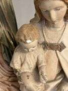 Four Religious Figurines Featuring Virgin Mary, Jesus, and Saints