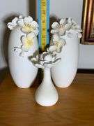 Three White Ceramic Vases with Applied Floral Detailing