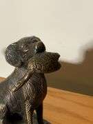 Bronze Dog Figurine Holding Duck