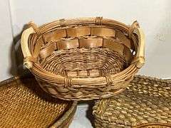 Five Woven Baskets in Various Styles and Sizes