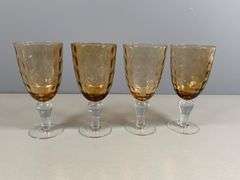 Four Amber-Colored Goblets with Clear Stems