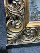 Ornately Carved Gilt Wall Mirror with Arched Design