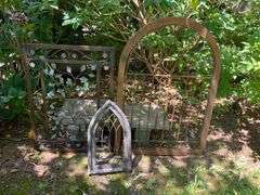 Decorative Yard Art Featuring Two Wood-Framed Pieces and One Metal Piece