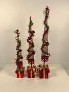 Three Decorative Red Metal Holiday Trees with Presents Base