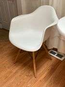 White Molded Chair with Wooden Legs and Metal Supports