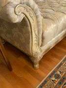 Chaise Lounge with Tufted Upholstery and Carved Wood Frame