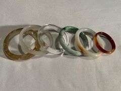 Six Glass Bangle Bracelets in Various Colors and Sizes