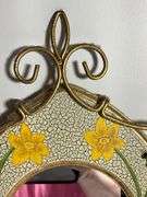 Decorative Wall Mirror With Floral Design and Metal Frame