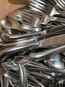 Large Assortment of Stainless Steel Flatware and Knives