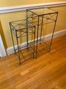 Two Metal and Glass Pedestal Tables