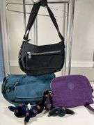 Four Kipling Nylon Shoulder Bags with Monkey Keychains