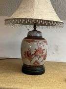 Table Lamp With Ceramic Base Depicting Figurative Scene and Embellished Shade